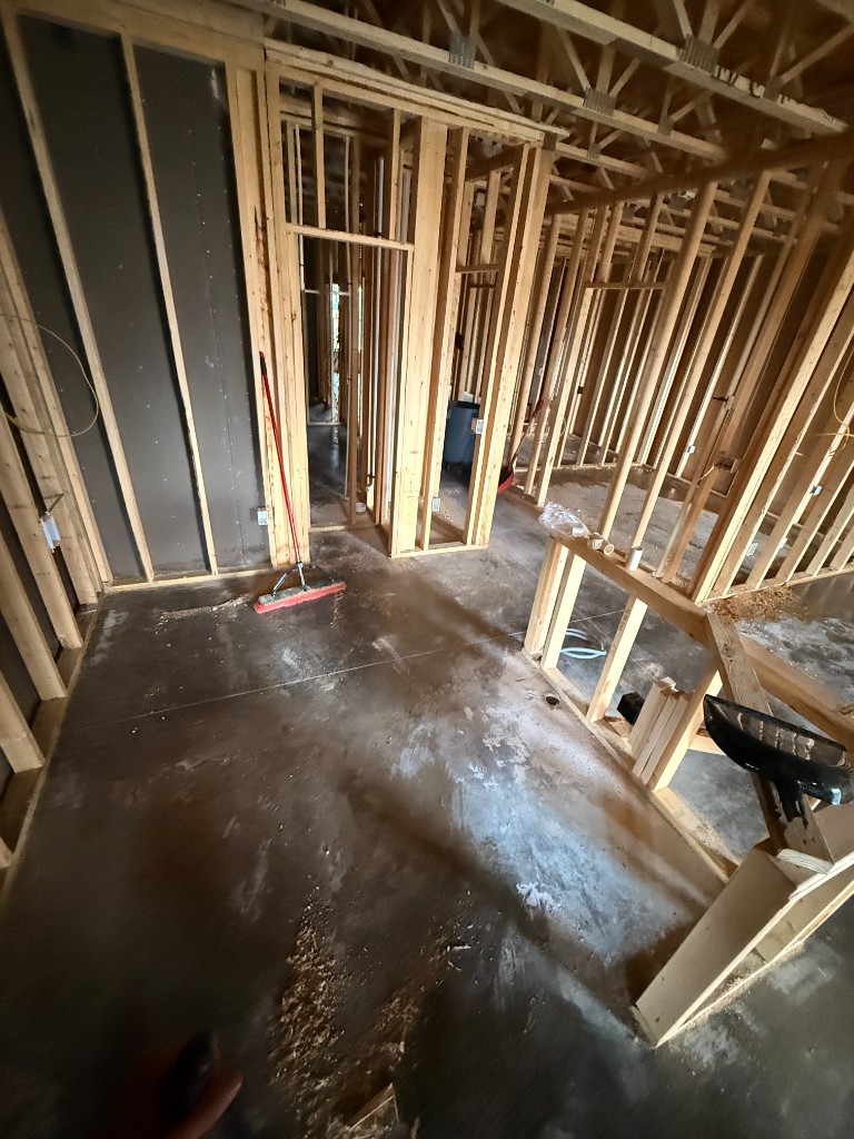 Pre-clean concrete floor condition with moisture and residue